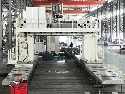 Moving Gantry & Fixed Table Type